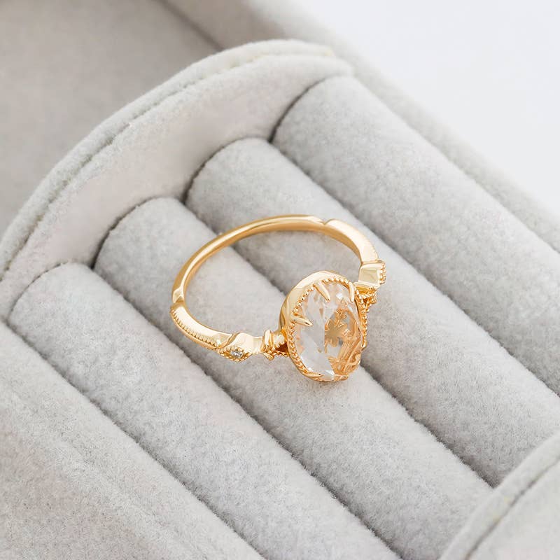 Clear Quartz Ring with Gold Detailing