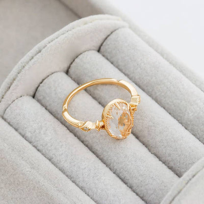 Clear Quartz Ring with Gold Detailing