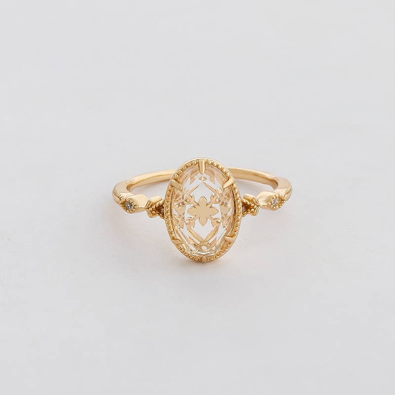 Clear Quartz Ring with Gold Detailing