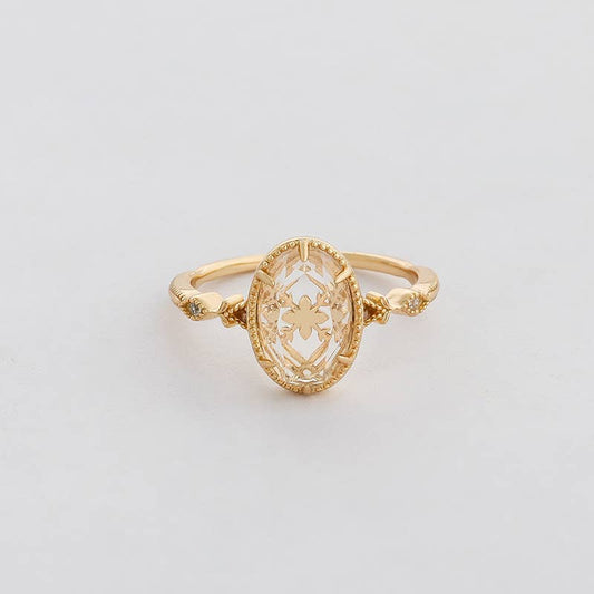 Clear Quartz Ring with Gold Detailing